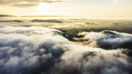 Aerial view of landscape Sunrise above clouds dramatic light