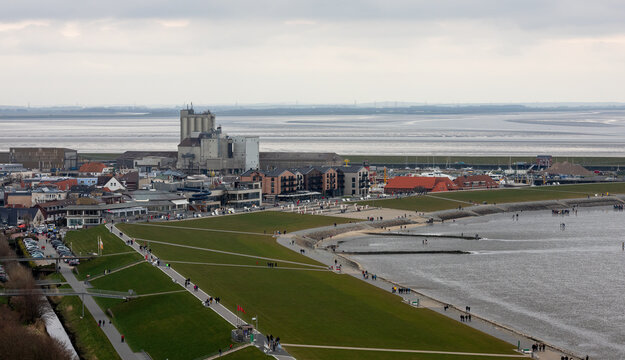 View from the high-rise over the North Sea Bay of B&uuml;sum at low tide with mudflat hikers