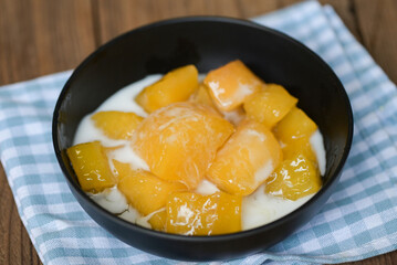cassava food on the table food, sweet dessert made of boiled cassava, sugar and coconut milik - Thai food