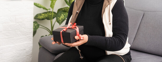 woman the gift box. Marry Christmas and Happy Holidays