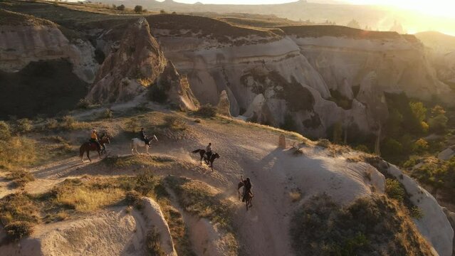 Panoramic view of Cappadocia with people on horse riding
