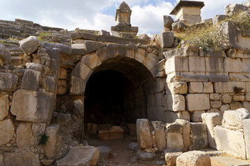 Ancient city of Xanthos in turkey. Stone columns with decoration and decor. Ruins of ancient Greek civilization, stone objects of culture and art.