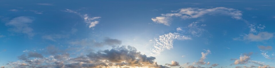 Obraz premium Dark blue sunset sky panorama with golden Cumulus clouds. Seamle