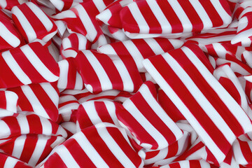 Fototapeta na wymiar Close-up of red and white striped background candy sweets for christmas