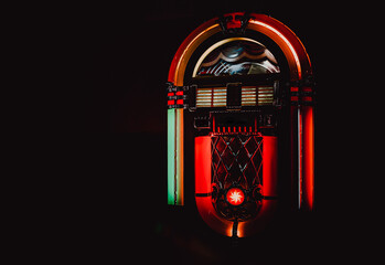 Retro jukebox on black background