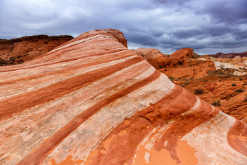 Red sandstone rock formation Fire Wave inside Valley of Fire State Park in Nevada in the United States