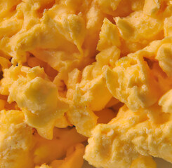 Image of full frame of close up of fresh scrambled eggs created using Generative AI technology