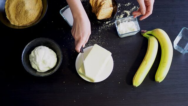 Cooking Banoffi cake at home in the kitchen, pastry recipe.