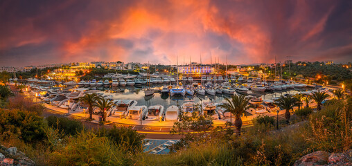 Landscape with panoramic night scene of Cala D`or port in Palma Mallorca Island, Spain