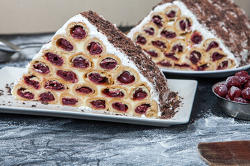 A traditional Moldavian dessert or cake consisting of pancakes with cherry, milk creme and chocolate creme also called Cosma lui Guguta.
