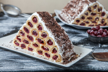 A traditional Moldavian dessert or cake consisting of pancakes with cherry, milk creme and chocolate creme also called Cosma lui Guguta.