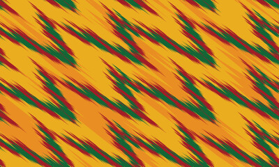 Seamless yellow, green, red abstract ikat pattern in earthy color. Abstract background for textile design, wallpaper, surface textures, wrapping paper.