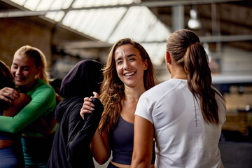 Women laughing after a gym class