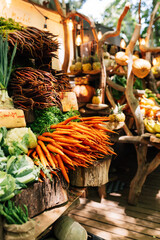 View on a stall in a farmer's market with a lot of vegetables