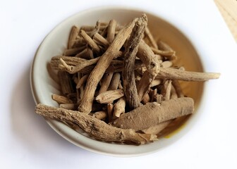 Organic Ashwagandha (Withania somnifera) roots.  Also known as Indian Ginseng or Indian Winter cherry. A well known ayrvedic herb, India.