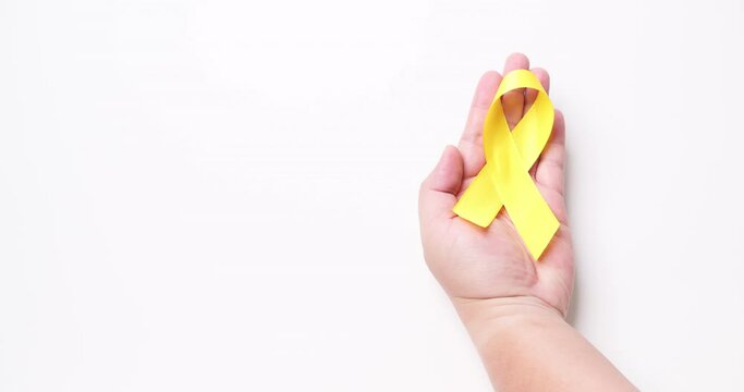 Suicide prevention day, Childhood, Sarcoma, bone, and bladder cancer Awareness month and Yellow Ribbon for supporting people's life and illness. children's Healthcare and World cancer day concept