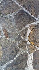 stone texture. abstract texture. a set of stones of different shapes. Vertical image.