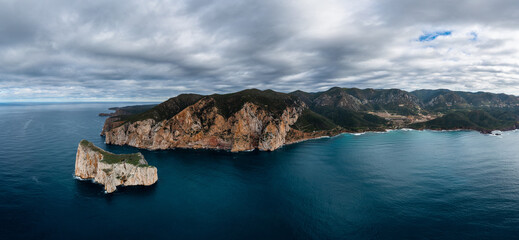 Fototapeta premium panorama landscape of the cliffs and sea stacks at Porto Flavia on Sardinia