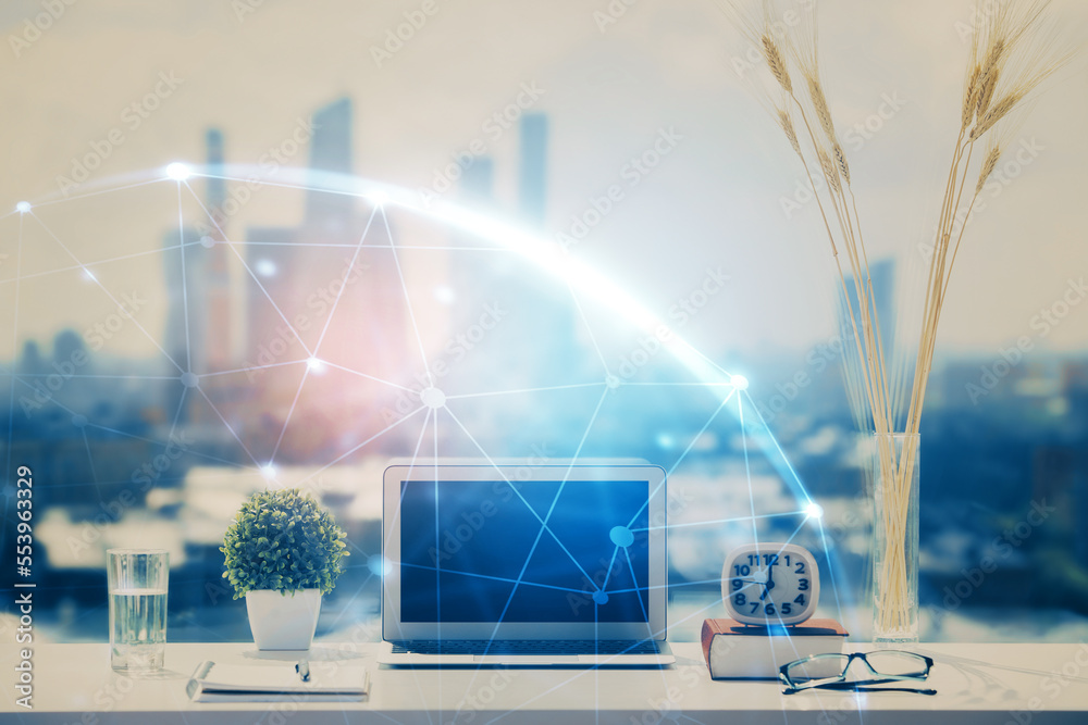 Poster computer on desktop with social network hologram. double exposure. concept of international people c