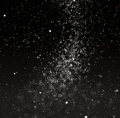 Fototapeta na wymiar Image of close up of multiple grey particles on dark background created using Generative AI technology