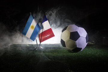 Soccer 2022. Grand Final Argentina vs France theme. Soccer ball on green grass. Support your...