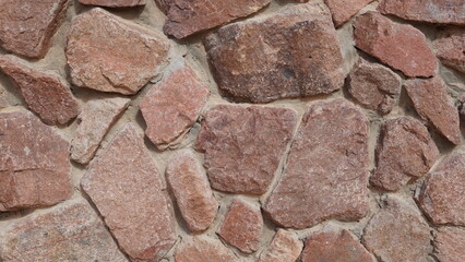 Texture of a stone wall. Old castle stone wall texture background. Stone wall as a background or texture. Part of a stone wall, for background or texture