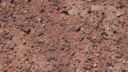 Red soil terrain after rain, in the national geological Timna park, Israel