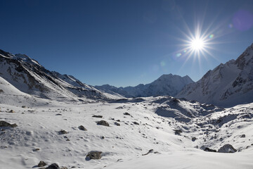 sunrise over snowy mountains
