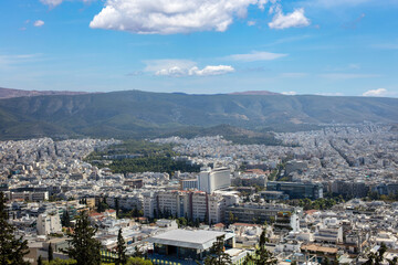 Fototapeta na wymiar Greece. Panoramic view of Athens city, blue sky background. Above view from Lycabettus hill.