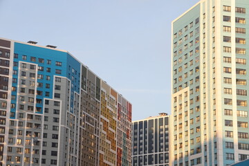 MOSCOW, RUSSIA -December 2022: Facades of new buildings in a residential complex in Butovo, Moscow, Russia. Modern style in architecture. House in a residential area of Moscow.