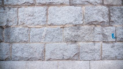 Muro de bloques de piedra gris