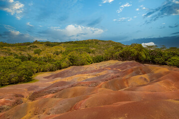 Chamarel Seven Colored Earth Geopark in Riviere noire district. Colorful panoramic landscape about this volcanic geological formation which is one of the big attracions in the island