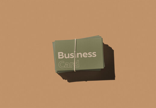 Stack of Horizontal Business Card Mockup With a Elastic Band