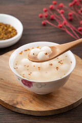 Little white tangyuan with sweet osmanthus honey and syrup soup.