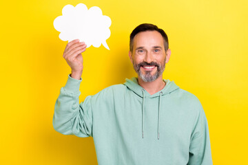 Photo of middle aged man grey bristle smile hold paper cloud empty space genius idea solve global...