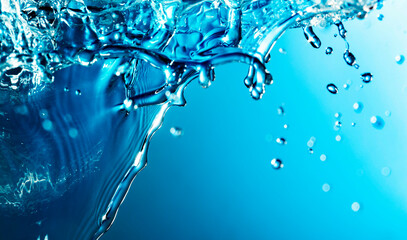 Fototapeta na wymiar abstract water splash on blue background