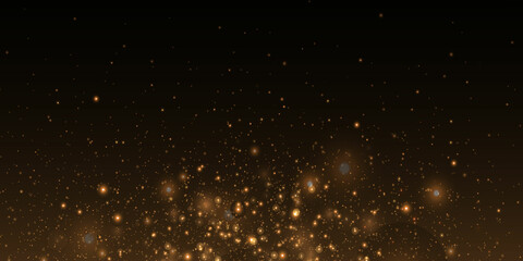 Christmas background. Magic shining gold dust. Fine, shiny dust bokeh particles fall off slightly. Fantastic shimmer effect. 