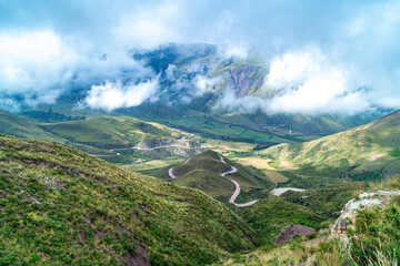 winding mountain roads in the Andes Mountains with a sky overcast with clouds. 