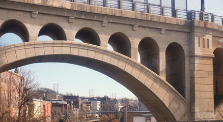View of a Riverfront Neighborhood from an Arched Bridge
