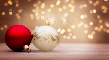 Christmas balls on wooden table, defocus lights in the background