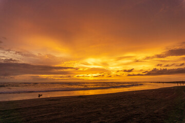 Seascape - sunset on the beach, waves, horizon. Top view. landscape. Parangtritis Beach, Yogyakarta