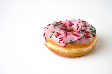  Pink Strawberry sprinkle donuts isolated on white background
