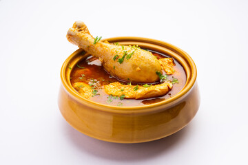 Red Chicken Curry or murgh Masala or korma with prominent Leg Piece - obrazy, fototapety, plakaty