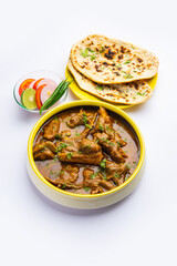 Indian style Mutton OR Gosht Masala OR indian lamb meat rogan josh served with Naan