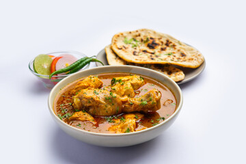 Red Chicken Curry or murgh Masala or korma with prominent Leg Piece