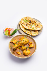Red Chicken Curry or murgh Masala or korma with prominent Leg Piece