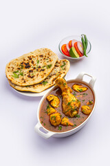 Red Chicken Curry or murgh Masala or korma with prominent Leg Piece