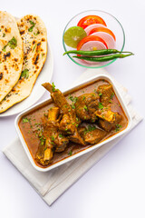 Indian style Mutton OR Gosht Masala OR indian lamb meat rogan josh served with Naan