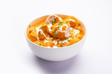 Tasty butter chicken curry or Murg Makhanwala or masala dish from Indian cuisine © StockImageFactory