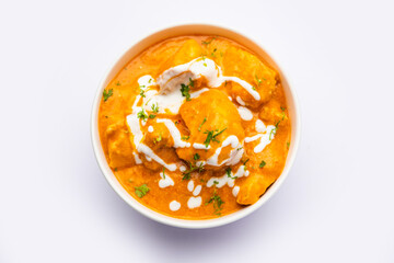 Tasty butter chicken curry or Murg Makhanwala or masala dish from Indian cuisine